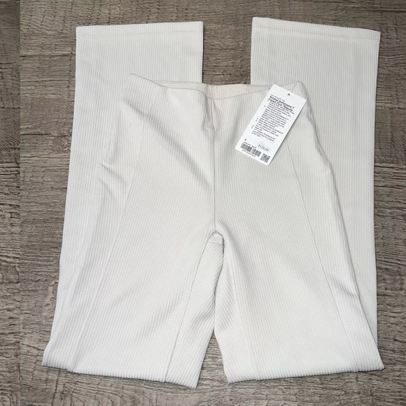 lululemon athletica Pants - NWT Lululemon Ribbed Softstreme Flared Pant Regular 33" L Bone Size 4